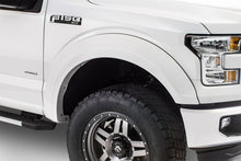 Load image into Gallery viewer, Bushwacker 15-17 Ford F-150 Styleside Extend-A-Fender Style Flares 4pc 67.1/78.9/97.6in Bed - Black