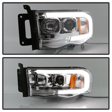 Load image into Gallery viewer, Spyder Dodge Ram 1500 02-05 V2 Projector Headlights - Light Bar DRL - Chrome PRO-YD-DR02V2-LB-C