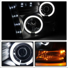 Load image into Gallery viewer, Spyder Dodge Ram 1500 09-14 Projector Halogen Model- CCFL Halo LED - Blk Smke PRO-YD-DR09-CCFL-BSM