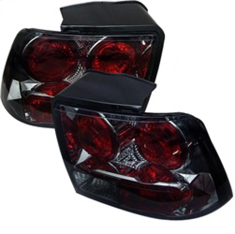 Spyder Ford Mustang 99-04 (will not fit the Cobra model)Euro Style Tail Lights Smoke ALT-YD-FM99-SM