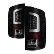 Load image into Gallery viewer, Spyder 07-09 Dodge Ram 2500/3500 V3 Light Bar LED Tail Lights - Blk Smoke ALT-YD-DRAM06V3-LBLED-BSM